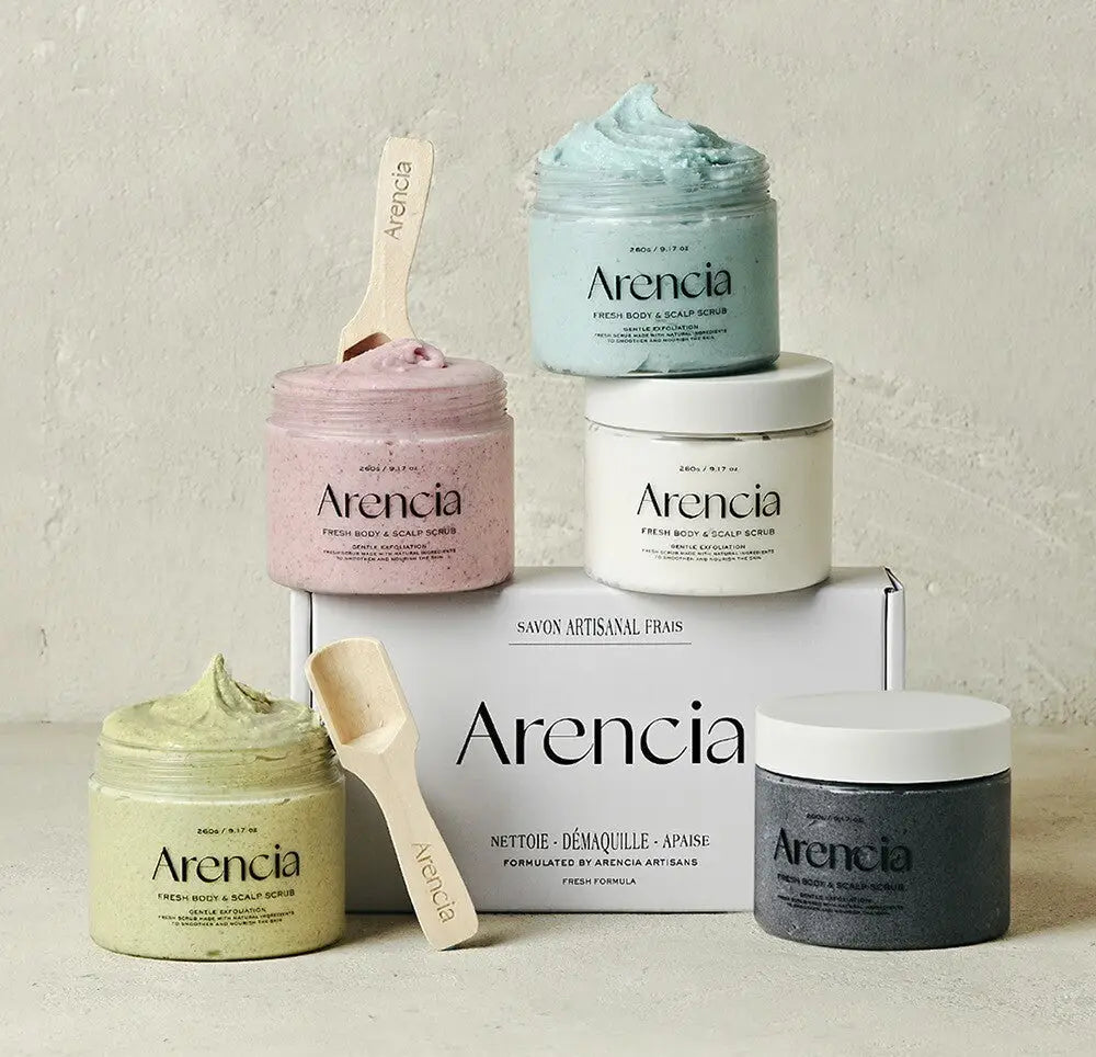 Assorted Arencia jars of body and scalp scrub collection on display